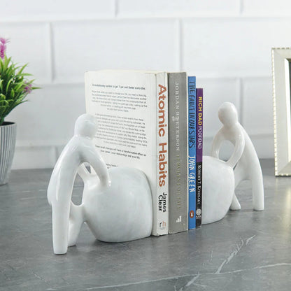 Man Pushing Stone Bookends - set of 2